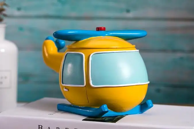 Criativo helicóptero estilo crianças leite dentes organizador