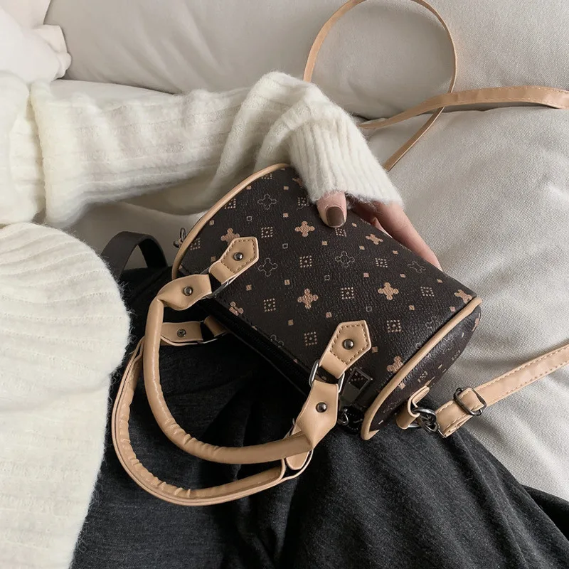 

Retro solid color bucket clutch fashion Korean version of the shoulder shoulder bag luxury handbag designer