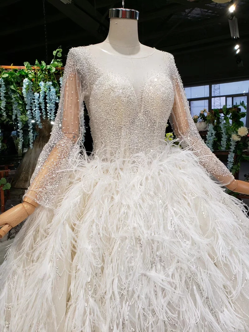 HTL987 с длинным рукавом скромное свадебное платье с пером о-образным вырезом Иллюзия сзади африканские Свадебные платья vestido de noiva манга longa