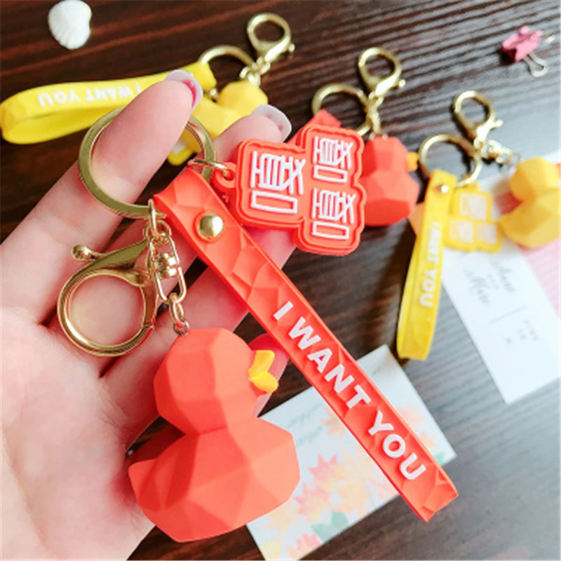 

2019 new fashion cute duck keychain fashion dinosaur keychain plush cartoon PU creative keychain car bag mobile phone keychain