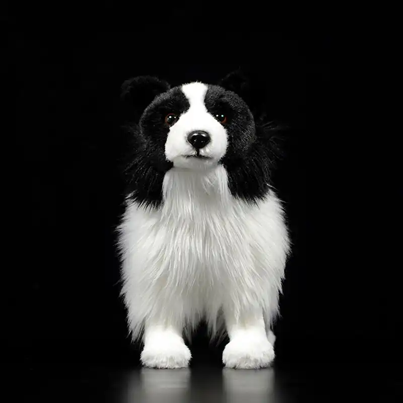 peluche perro blanco y negro