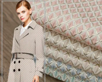 

Custom high-grade gold jacquard fashion fabric Geometric diamond-shaped gold embossed suit windbreaker small fragrance fabric