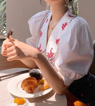 

Cosmicchic Women Puff Sleeve Blouse Floral Embroidery Collar Deep V-Neck Vintage White Shirt Fashion Kimono Tops