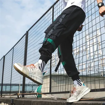 

2020 new Streetwear Black Harem Pants Men Elastic Waist Punk Pants With Ribbons Casual Slim Jogger Pants Men Hip Hop Trousers