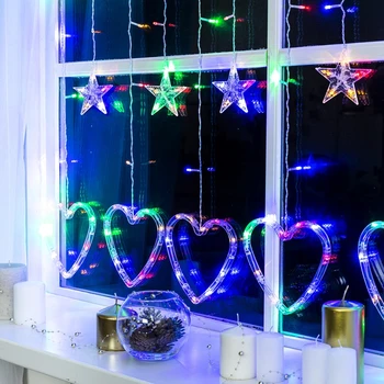 

Garland "Fringe" 2.4 x 0.9 m with nozzles "Heart", IP20, transparent thread, 186 LED, multi glow, 8 modes, 220 V