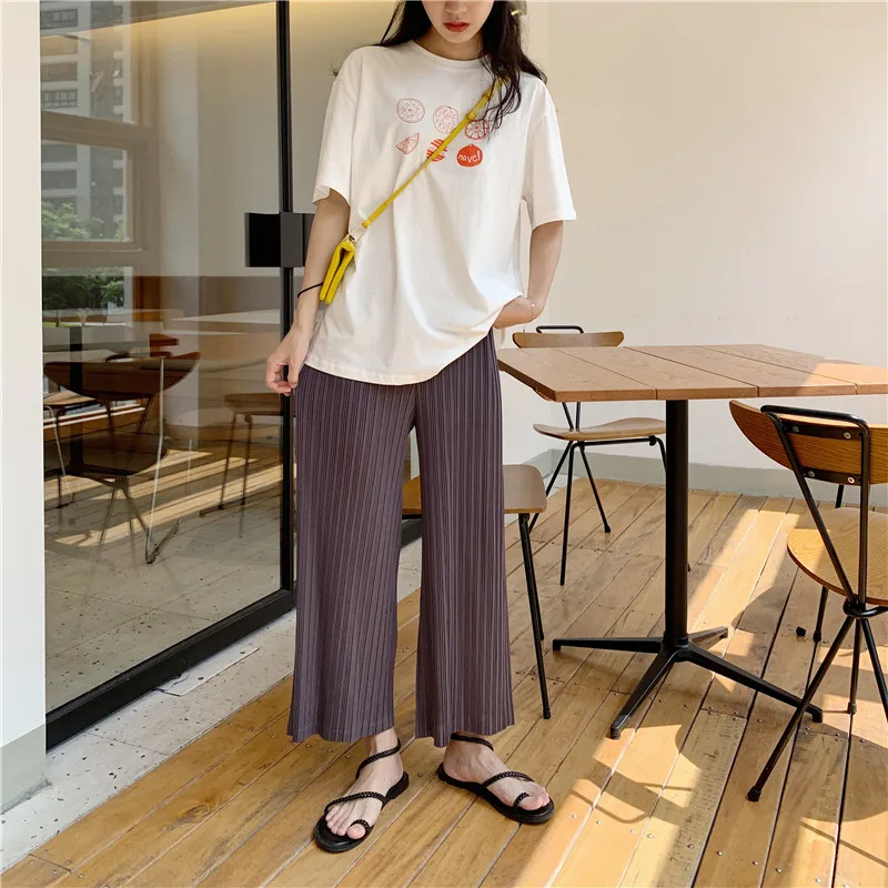 Miyake's loose slim wrinkled wide-legged pants and nine-minute pants free shipping