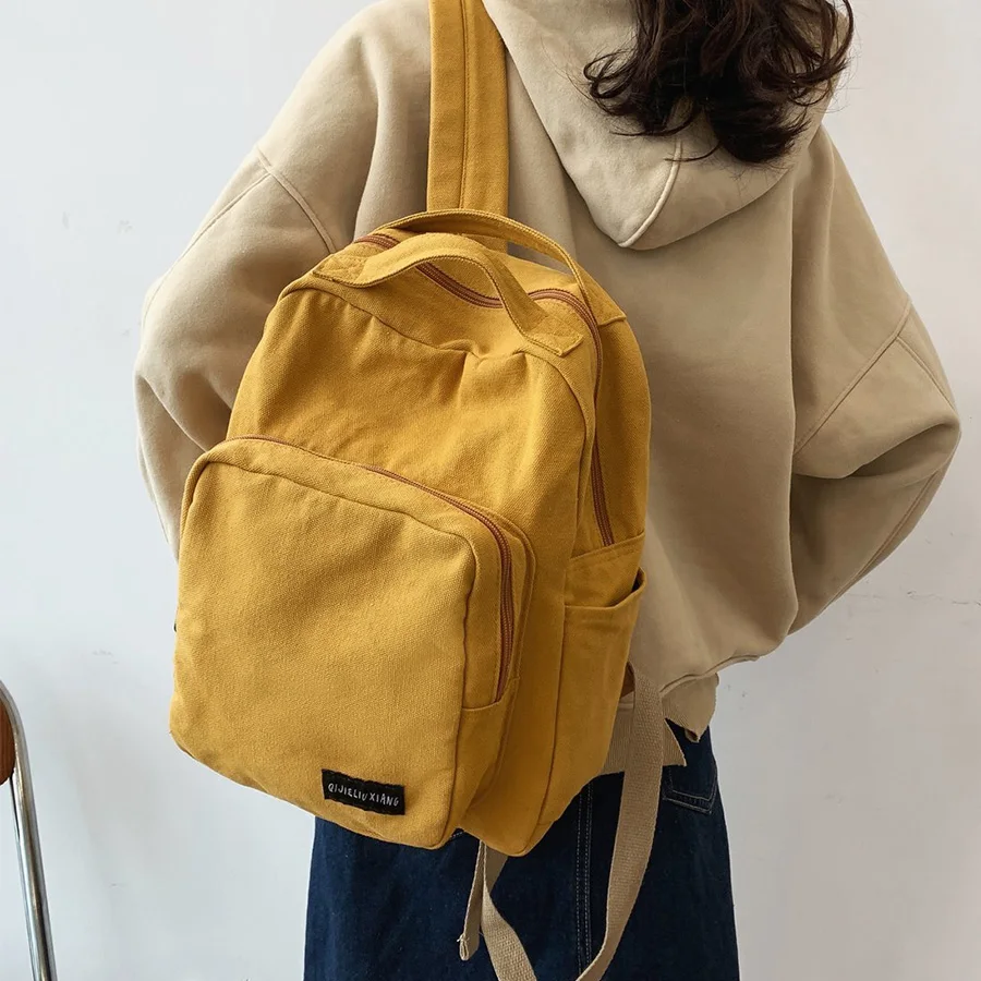 Mochila de lona Vintage para mujer, bolso de hombro clásico de Color sólido, mochila escolar de moda para chica adolescente, bolsa de viaje