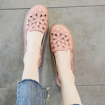 

2019 summer new style simple simple solid color hollow flower flat shoes women leather comfortable tendon sole casual shoes.