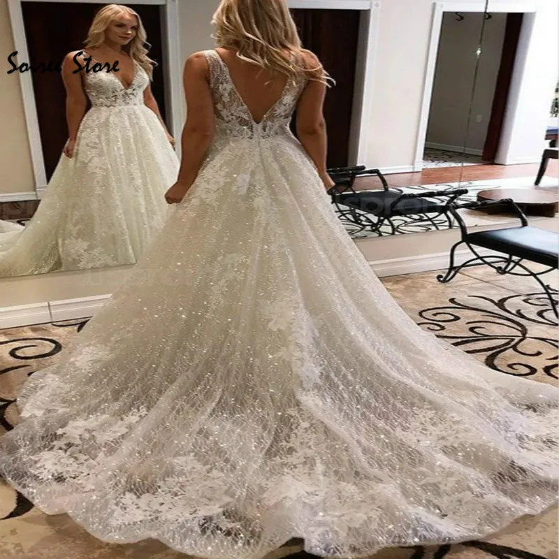 

Luxury Sparkly Country Wedding Dresses Deep V Neck Backless Appliques Church Garden Wedding Gowns Plus Size Shiny Bride Dress