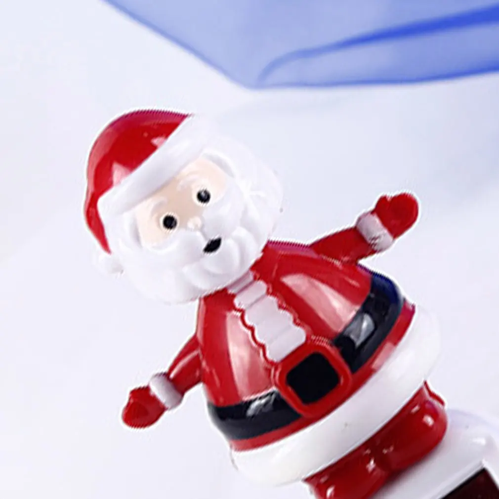 Santa Claus Elk Snowman Solar Shaking Head Action Figure Anime Penguin Angel Abs Toy Christmas Gift Car Interior Decoration