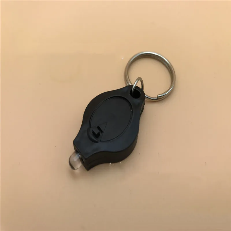 

Outdoor Camping Emergency Key Ring Light Mini Keychain Squeeze Light Micro LED Flashlight Torch