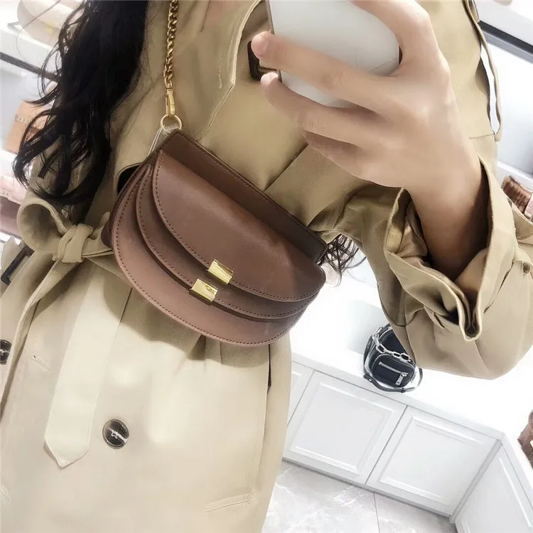 

Xiaozhong Running Genuine Leather Female Saddle Chain Mini Small Slung Half Moon Bag Single Shoulder Function