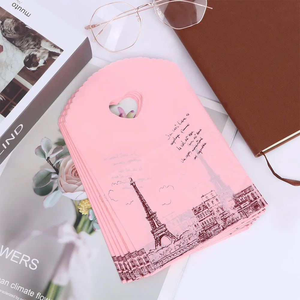 

50pcs/lot Cute Pink Paris Tower Packaging Bags Plastic Shopping Bags Mini Handbag Wedding Party Favor Gift Bags