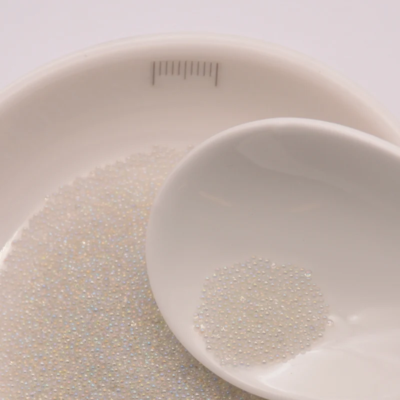 50 г около большинства 0,5-0,8 мм маленькие микро стеклянные бусины для украшения или дизайна ногтей - Цвет: 3. tracslucent