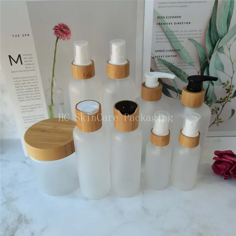 

Natural Bamboo Lid Plastic Frosted Lotion Bottles with bambu toner Pump eco friendly 4 oz 8oz bamboo cosmetic glass spray bottle