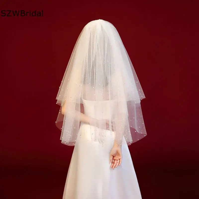 

New Arrival Pearls Beaded Ivory Bridal veils 2024 Two Layers Wedding hair accessories Cheap Bride Wedding Veil Urne mariage