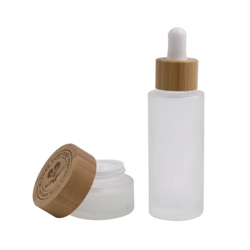 

50g luxury empty cosmetic eye cream glass jar with bamboo cap/lids，50g frosted clear face cream cosmetic jar with bamboo cap