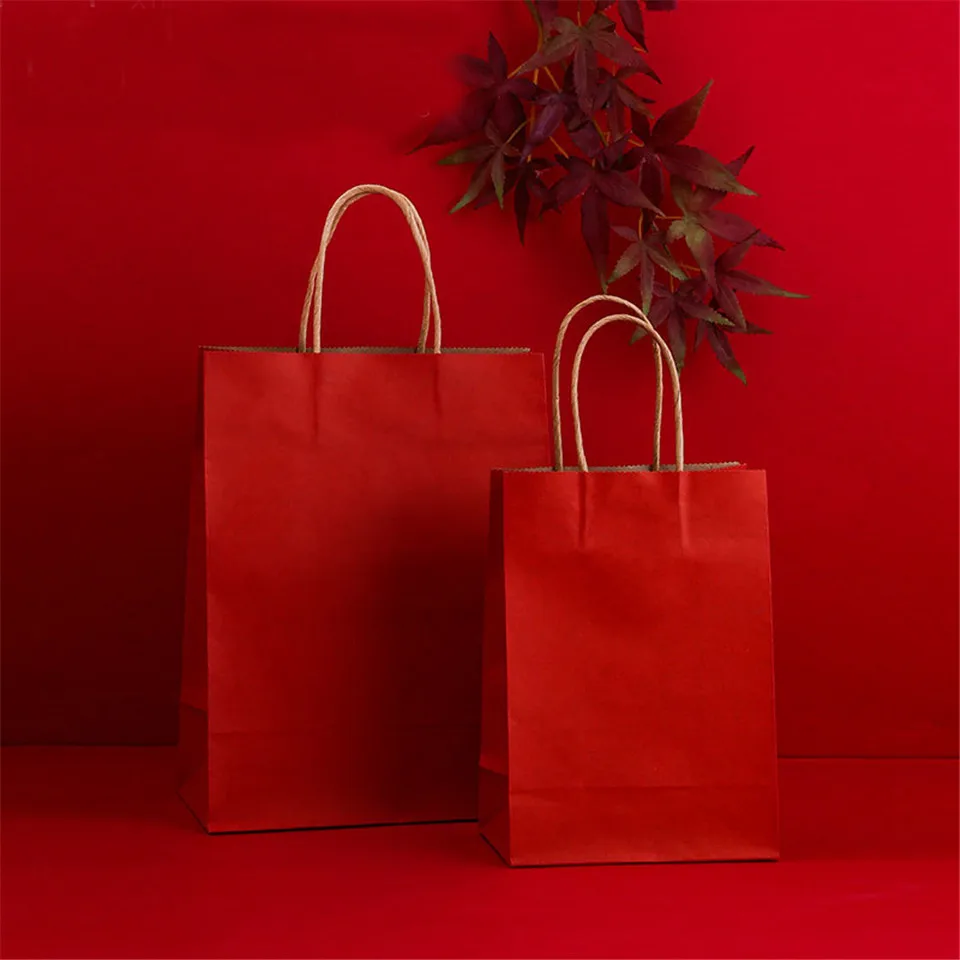 

Hand-held Paper Bag Clothing Shopping Gift Carry Bag Hand Kraft Paper Bag Customizable Gift Bags Grand Event Fashion Party Bags