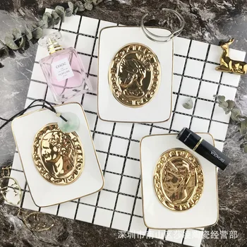 

A Arya Home Decoration Nordic Gold Character Ceramic Storage Candy Plate Ceramic Ornaments Jewelry Tray Soap Dish Jewelry