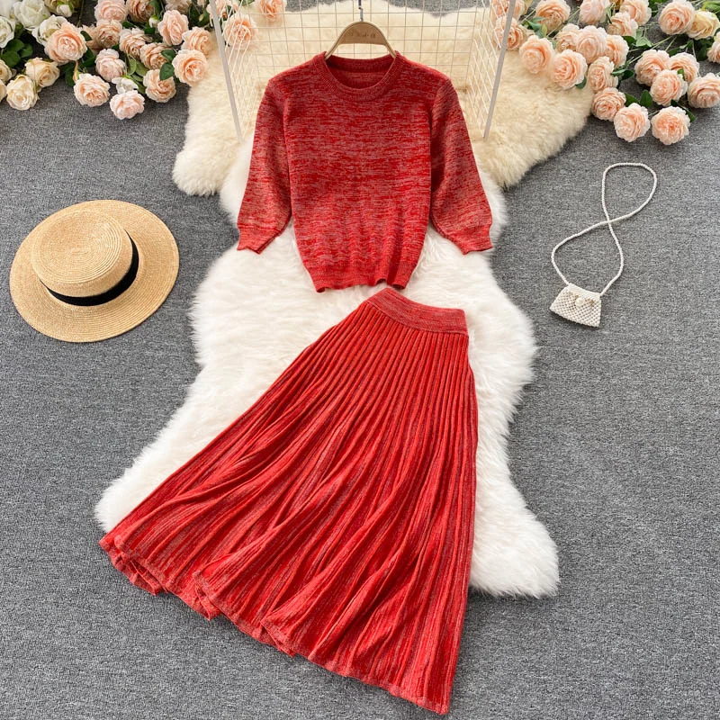 

New Women Knitted Two Piece Set O-neck Half Sleeve Pullover Sweater Top and Elastic Waist Midi Calf Pleated Skirt Suits