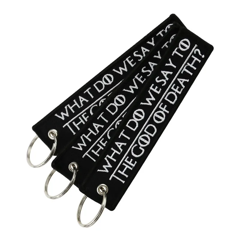 

COOL Motorcycle Keychains WHAT DO WE SAY TO THE GOD OF DEATH Chaveiro Key Tag Chains Embroidery Keychain for Motorcycle Key Ring