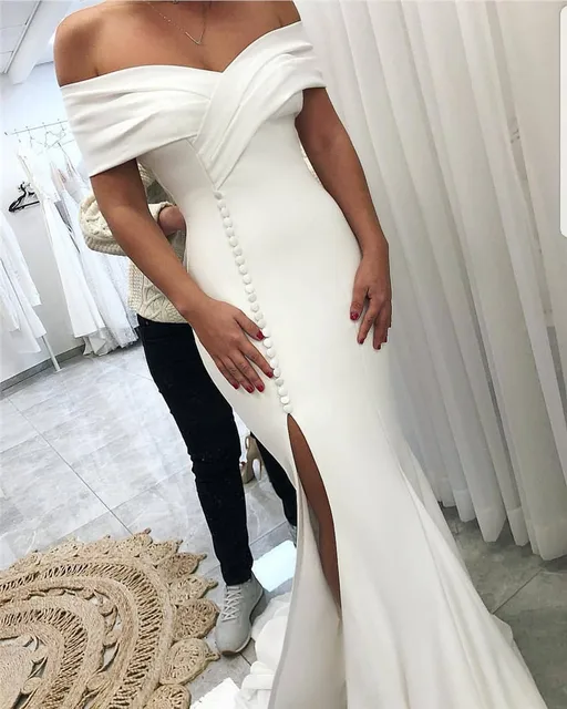 white satin off shoulder wedding dress