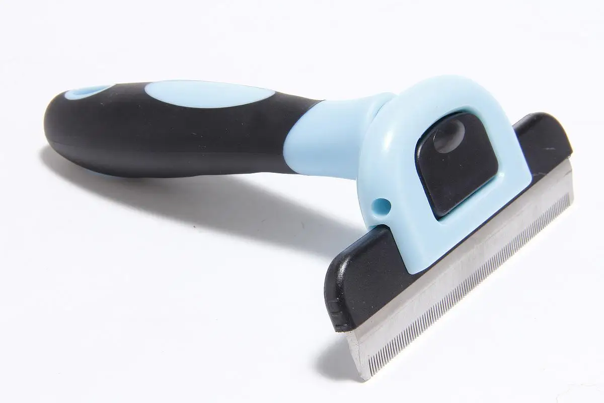 Pet hair removal comb (75). jpg