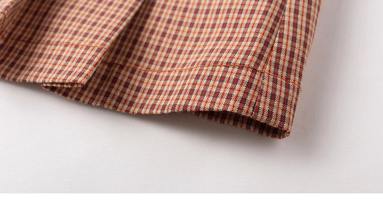 INMAN 2020 Autumn New Arrival Retro Style Vintage Check Button Asymmetrical Pleated Skirt