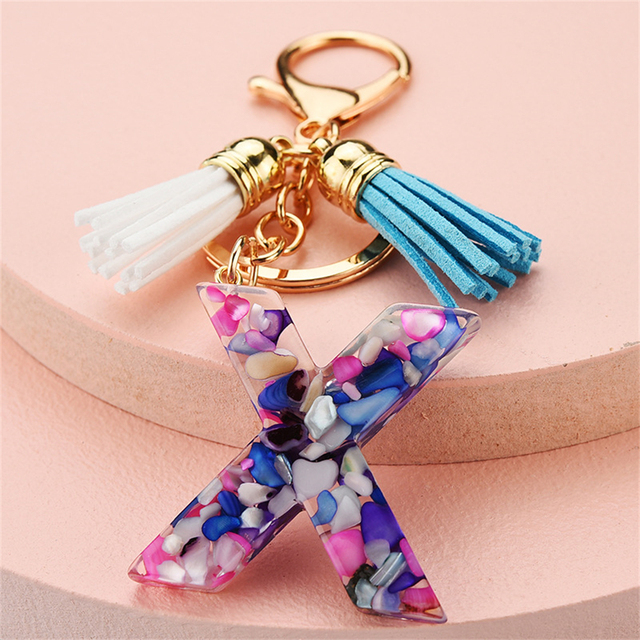 Women Keychains 26 Glitter Hollowed-out Words Handbag Tassel English Letter Keyring with Puffer Ball Charms Free Shipping