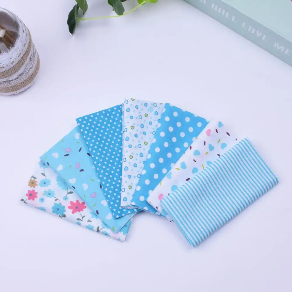 

DIY 7pcs/lots 25x25cm Blue Flower Piont Pattern100%Cotton Pur-cut Patchwork Fabric Bundle Sewing Quilting Crafts for Handmade