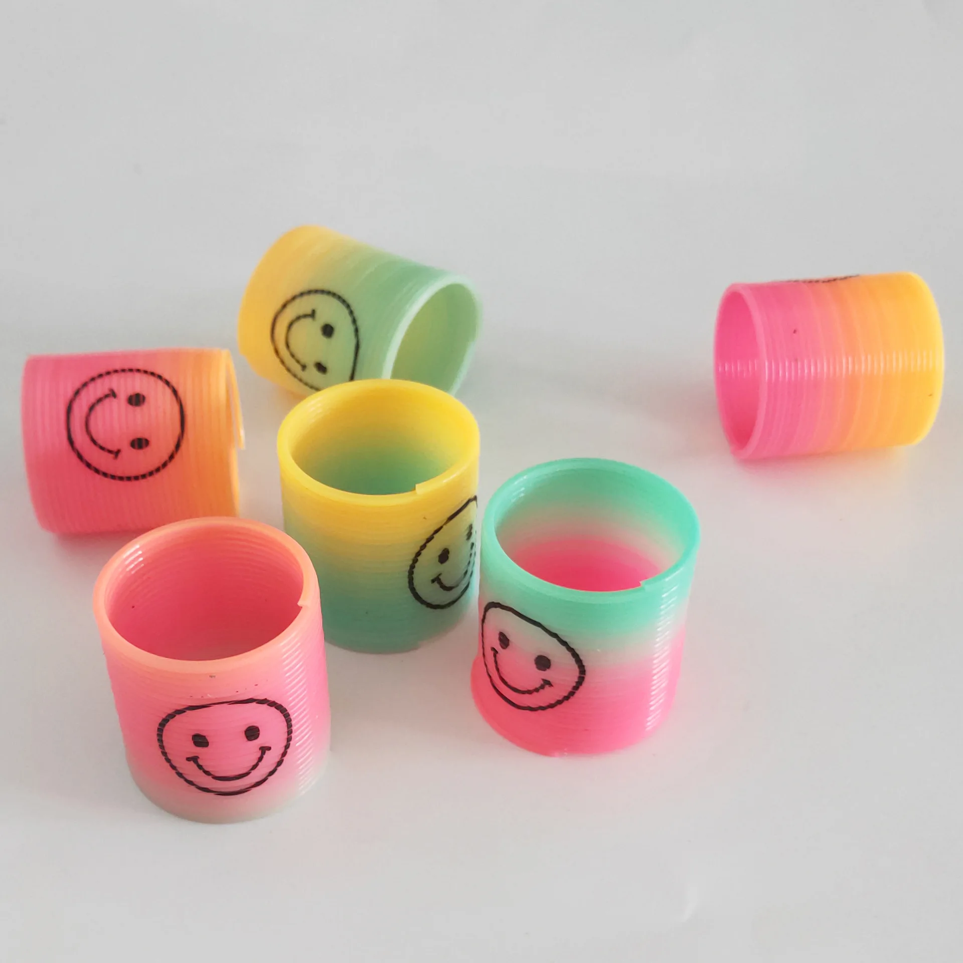 Ground Promotion Small Gift Smiley Spring Rainbow Ring Rainbow Tower Creative Children'S Educational Toy Gift 12 a Bag