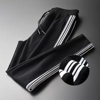 

New style yarn-dyed striped knitted fabric fashion casual sports pants men 2020 spring new color contrast straight pants men