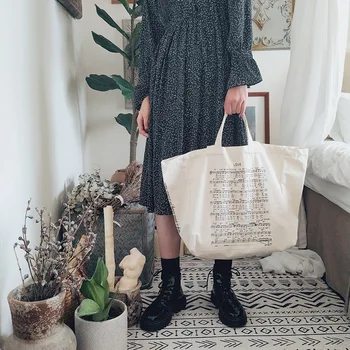 

Korean version of art students large capacity retro canvas bag female shoulder ins simple letter green bag