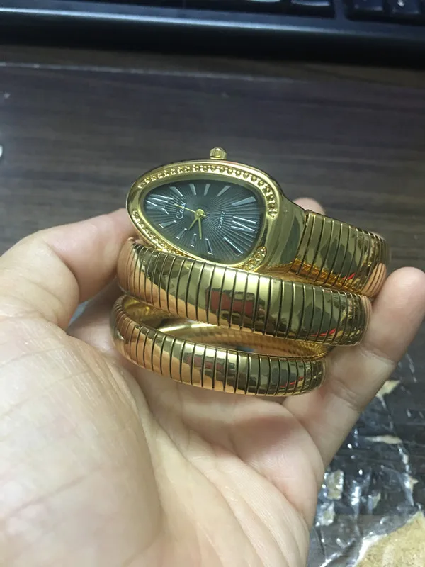 Модные женские часы со змеиным браслетом, часы с бесконечным браслетом, модные брендовые кварцевые часы для девочек, Religios Reloj Montre femme NW404 - Цвет: Steel Gold Black