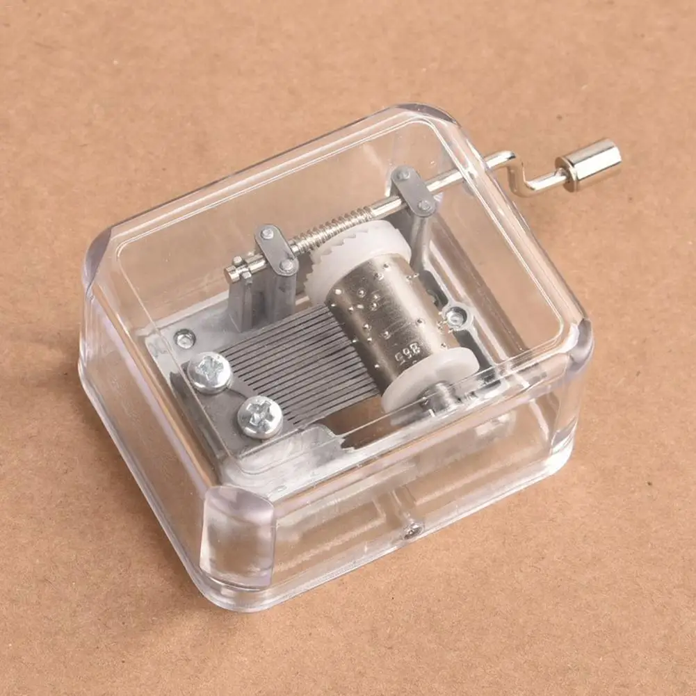 

Mini Music Box Hand Cranking Music Movement Silver-plating Metal + PVC Transparent Plastic DIY Music Box Children Christmas Gift