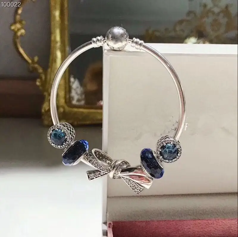 

Kristie 100% 925 Sterling Silver 1:1 Original High-Quality Reproduction Sapphire Bow Bracelet Free Postage Free