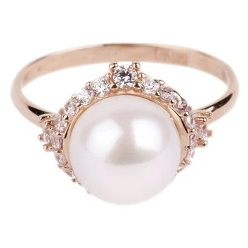

Примаэксклюзив ring with pearls and cubic zirconia in red gold