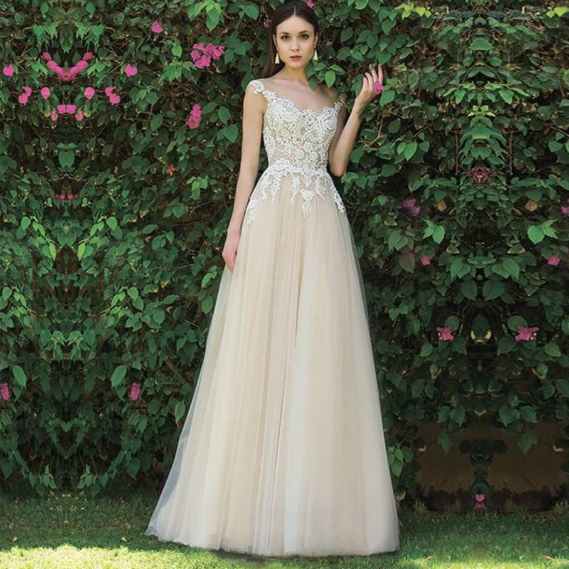 

Light Champagne A Line Wedding Dresses Sleeveless O Neck Wedding Gowns Lace Appliques Backless Bridal Dress Vestido De Novia