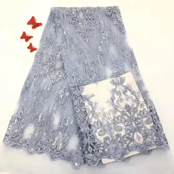 

Beautiful blue lady dess material African net lace fabric Fashion tulle material with sequins for sewing PAN293(5yards/lot)