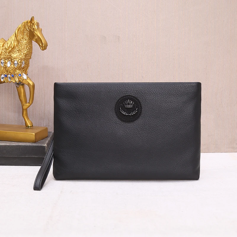 

2019 New leather men's and women's bag with a large-capacity fashion envelope bag head layer wrestling calf leather grip bag