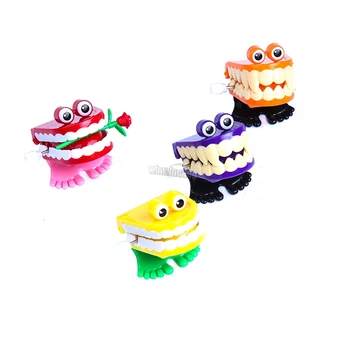 

4pcs spring clockwork jumping dental creative design children's toys dental clinic children's cute gift toys
