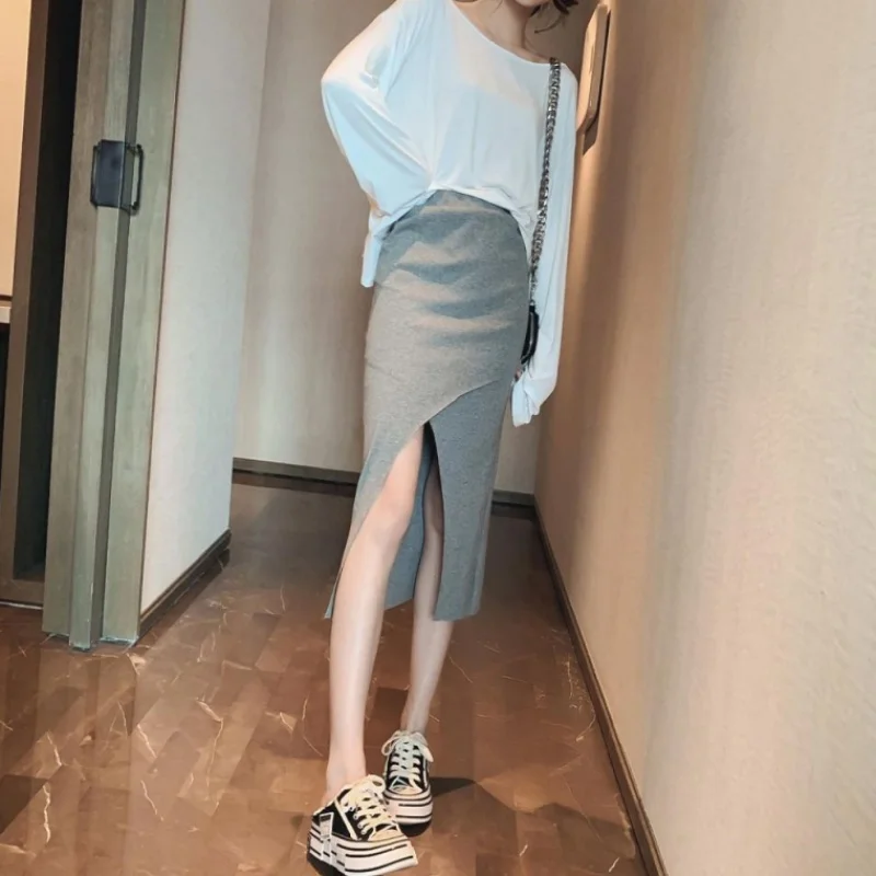 

Women's skirt spring and autumn mid-length female Korean version of the wild high waist step skirt was thin sexy split bag