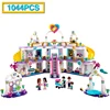 Изображение товара https://ae01.alicdn.com/kf/H5b6faf03162a474aa178f253f52f8a23I/1044pcs-Heartlake-City-Shopping-Mall-Building-Blocks-With-5-Mini-figures-Sets-Toys-For-Children-Girl.jpg