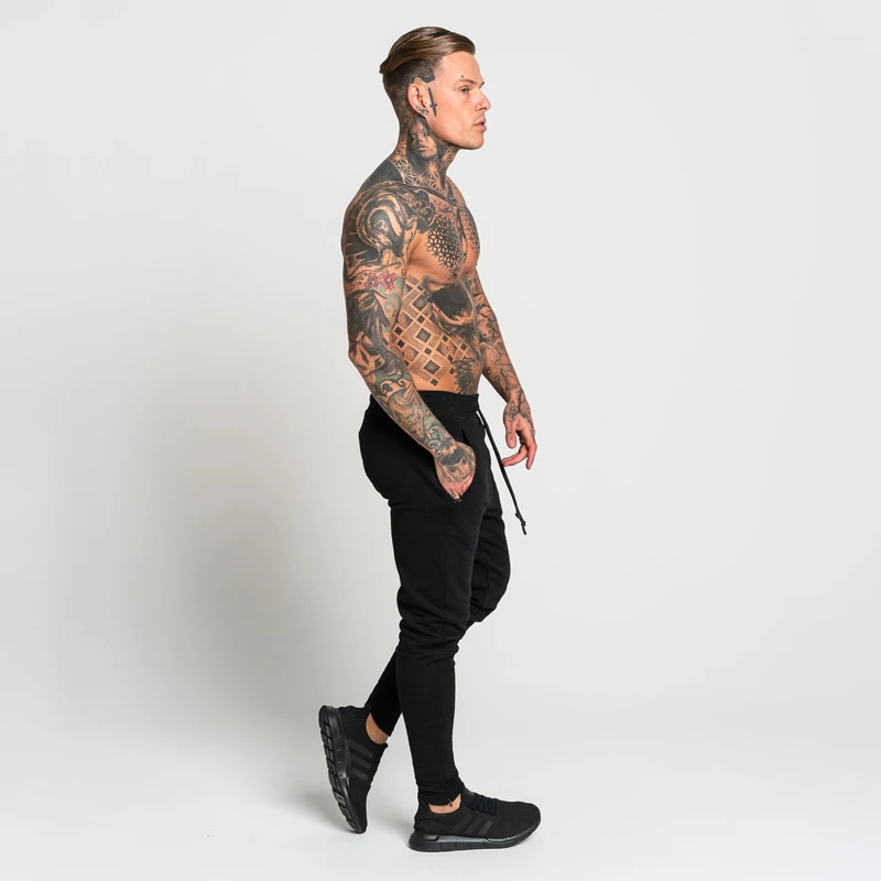 Новые популярные мужские спортивные штаны jogger модные спортивные штаны уличная облегающие спортивные брюки мужские повседневные брюки