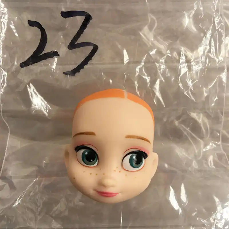 baby doll heads with hair