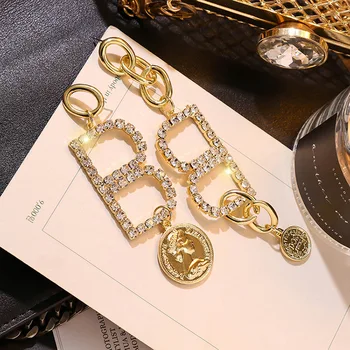 

Europe and America Fashion Personality Rhinestones Letters Asymmetry Long Earrings Temperament Women Girl Jewelry Accessories
