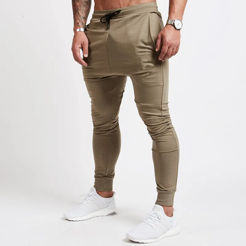 

2019 Fashion Men Gyms Pants Joggers Fitness Casual Long Pants Men Workout Skinny Sweatpants Jogger Tracksuit Cotton Trousers