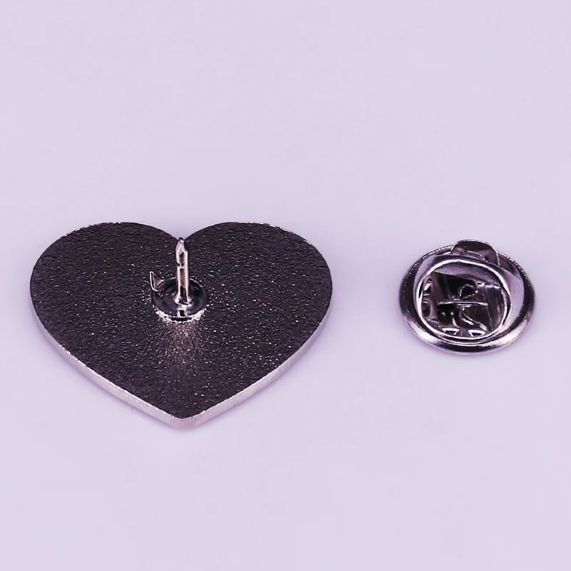 Keep calm with this Pulp Fiction inspired heart-shaped pink lapel pin cuz you’re harshing the vibe! .JPG