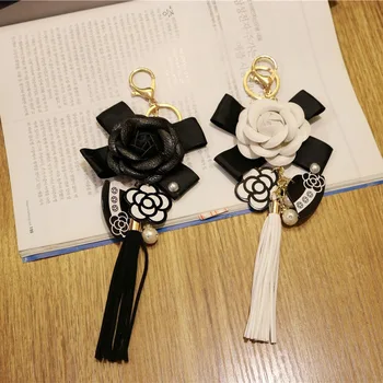 

2020 New Korean Trendy Leather Bag Camellia Keychain Long Tassel Car Hanger Flower Key Chain cc Element Jewelry Hanger Wholesale