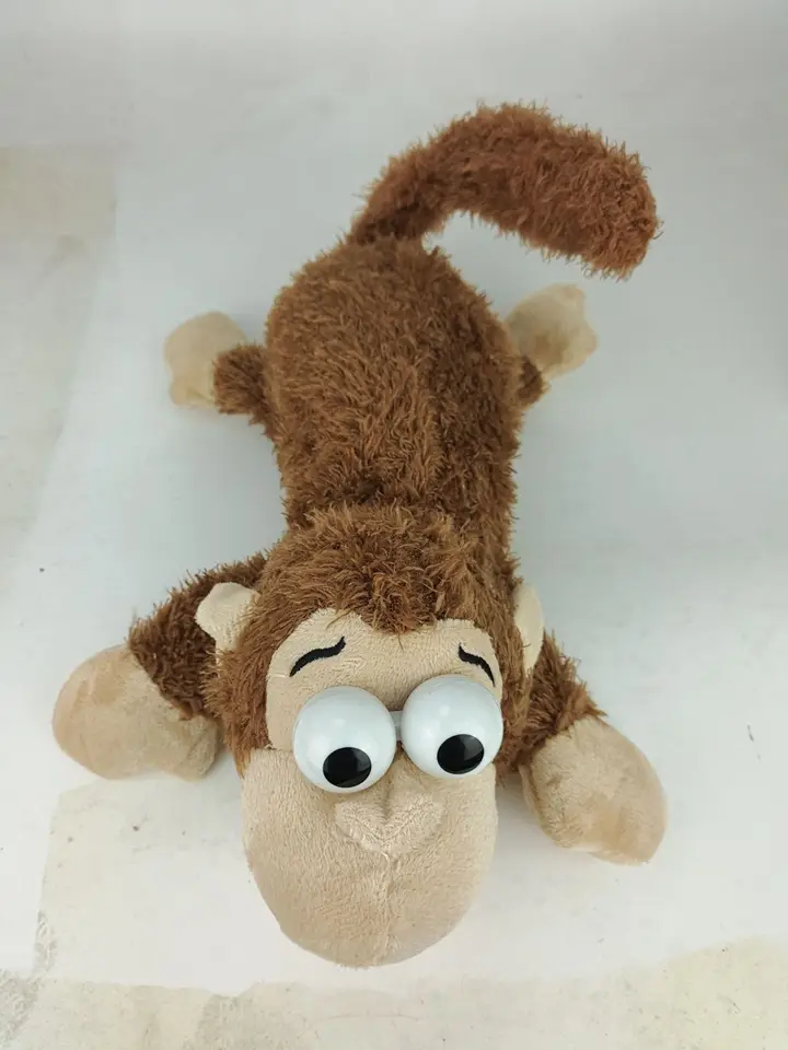 rolling laughing monkey toy